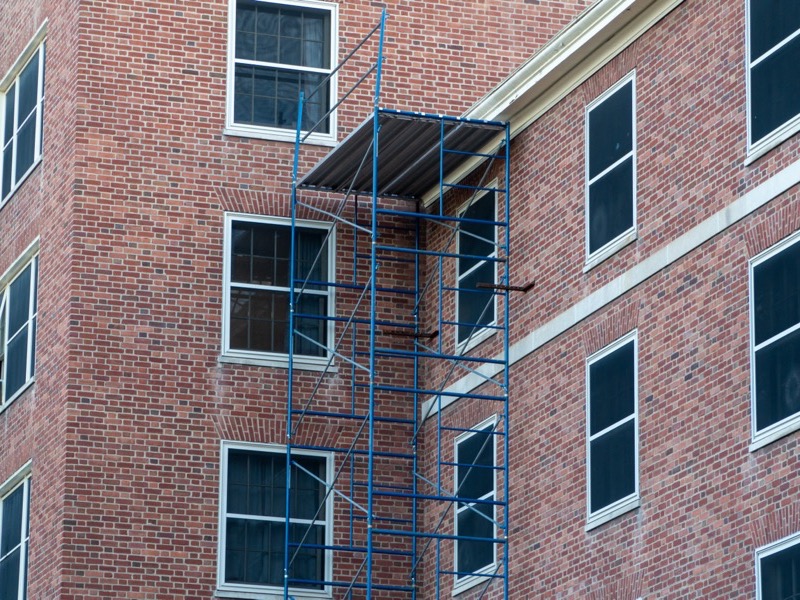 Commercial masonry facade repointing on a Baltimore building