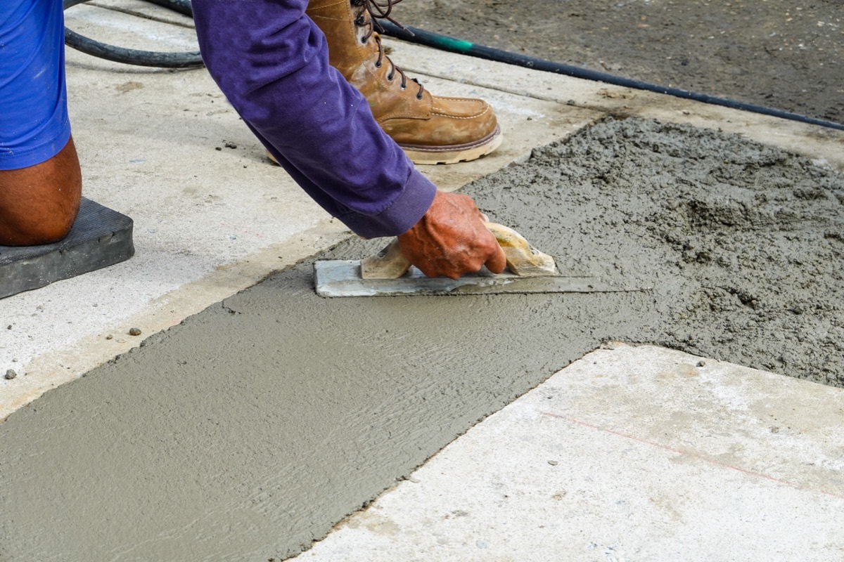 Control joints cut into a new concrete driveway slab in Baltimore
